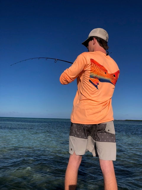 Redfish Tail on Orange Performance Fishing Shirt | UPF 50+ Sun Protecting