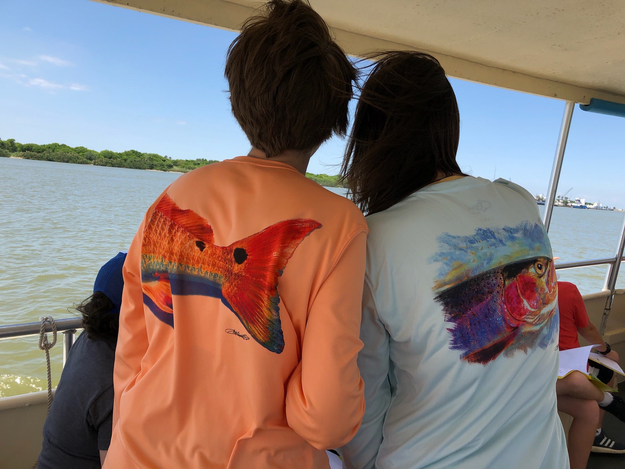 Redfish Tail on Orange Performance Fishing Shirt | UPF 50+ Sun Protecting