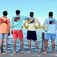 Group of men wearing various Speckled Trout UPF 50+ Fishing Shirts by the lake, showcasing colorful back designs and activewear versatility.