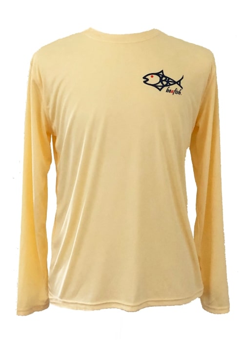 Front view of Speckled Trout UPF 50+ Fishing Shirt in light yellow with tribal trout logo, designed for moisture-wicking and comfort.